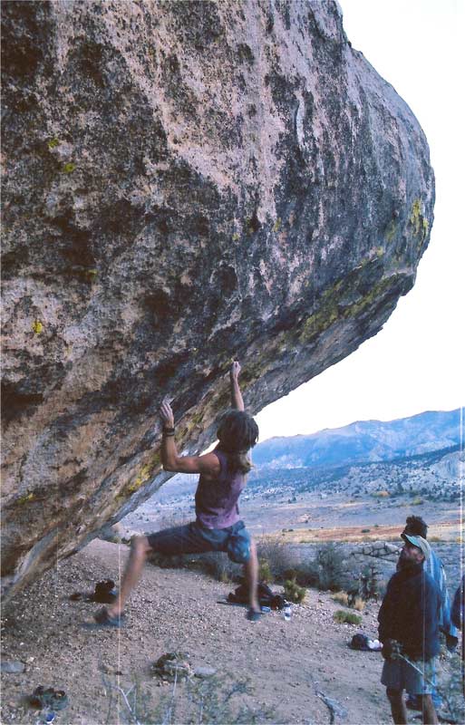 Jared Roth making the non-top-rope rehearsed first ascent of the 65-foot tall boulder problem, Rastaman Vibration 5.14d.